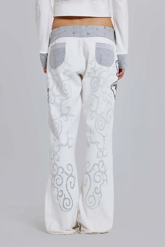 Pantalones de chándal con estampado «Rock Revival» y tachuelas