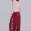 Pantalones de chándal Hardcore Jewel Monster Joggers en color burdeos