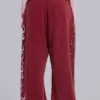 Pantalones de chándal Hardcore Jewel Monster Joggers en color burdeos