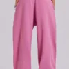 Pantalones de chándal holgados con puños «Monster» en rosa
