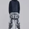 Pantalones de chándal holgados «Monster Joggers» con estampado gótico en gris jaspeado
