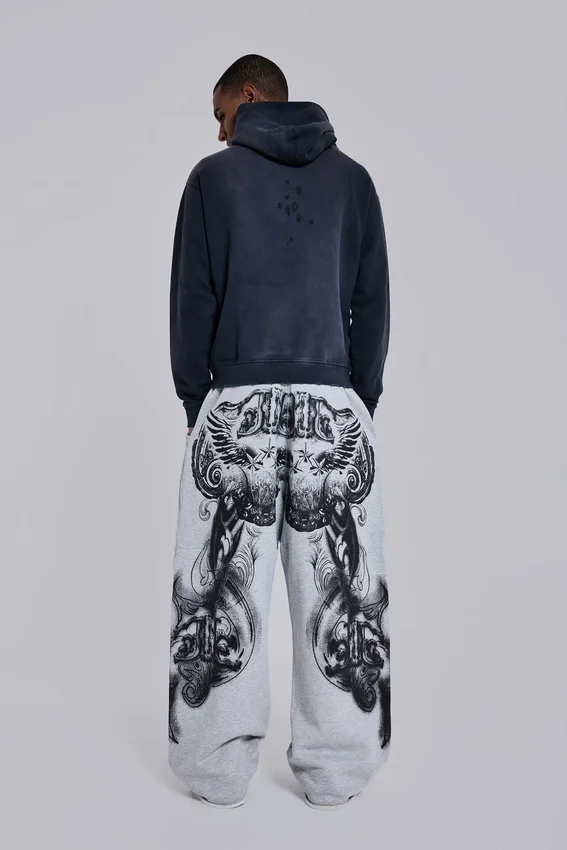 Pantalones de chándal holgados «Monster Joggers» con estampado gótico en gris jaspeado