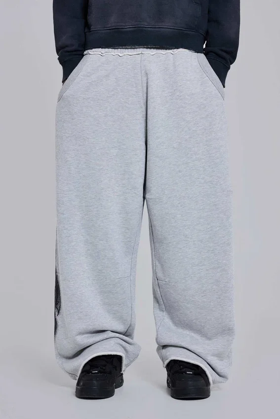 Pantalones de chándal holgados «Monster Joggers» con estampado gótico en gris jaspeado