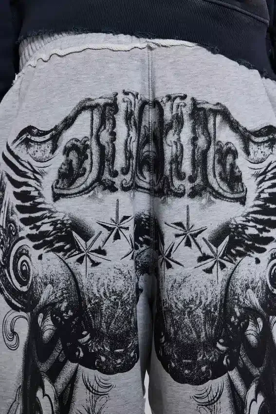 Pantalones de chándal holgados «Monster Joggers» con estampado gótico en gris jaspeado