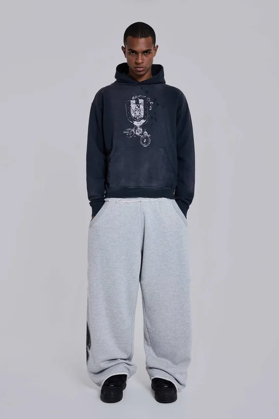 Pantalones de chándal holgados «Monster Joggers» con estampado gótico en gris jaspeado