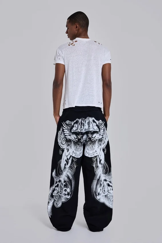 Pantalones de chándal holgados «Monster Joggers» negros con estampado gótico