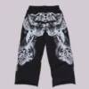 Pantalones de chándal holgados «Monster Joggers» negros con estampado gótico