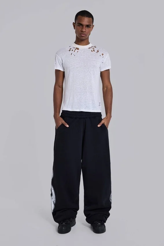 Pantalones de chándal holgados «Monster Joggers» negros con estampado gótico