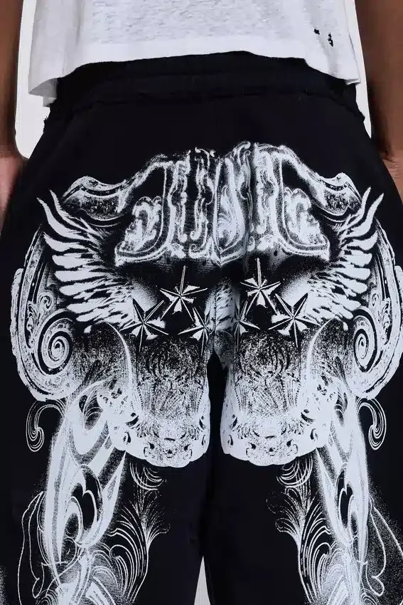 Pantalones de chándal holgados «Monster Joggers» negros con estampado gótico