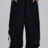 Pantalones de chándal holgados «Monster Joggers» negros con estampado gótico