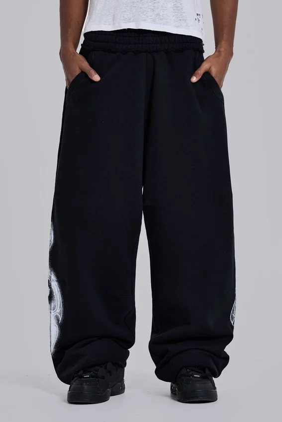 Pantalones de chándal holgados «Monster Joggers» negros con estampado gótico