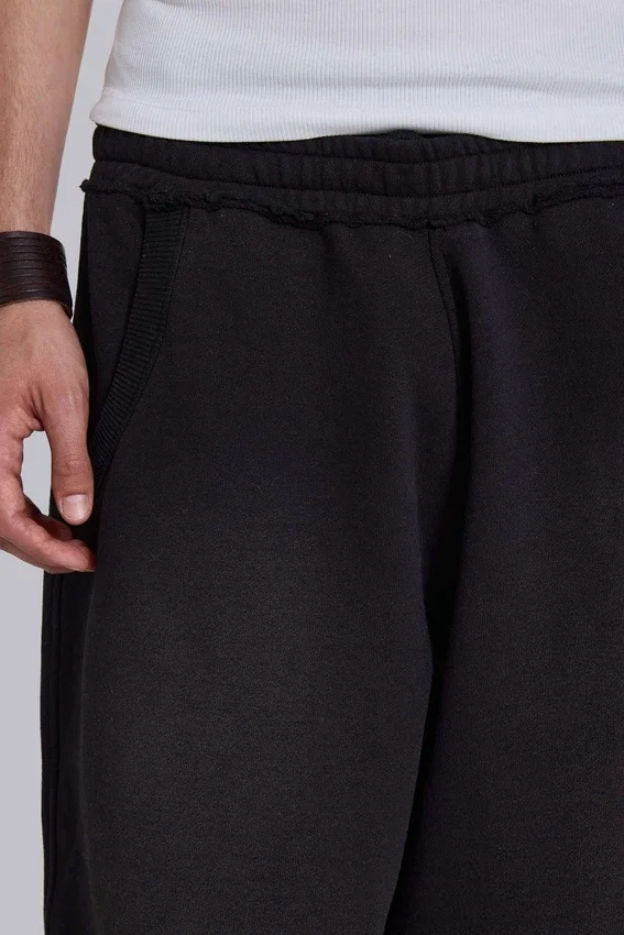 Pantalones de chándal holgados «Monster Joggers» negros con puños