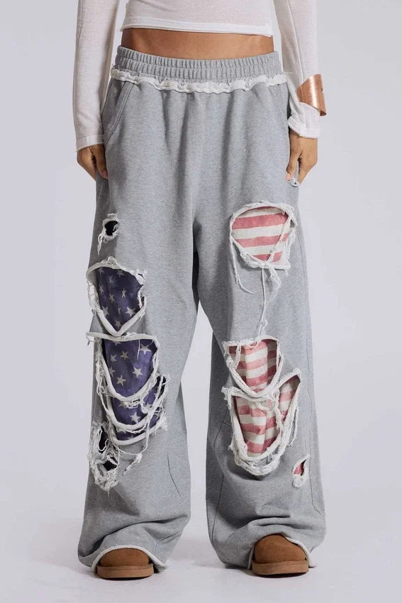 Pantalones de chándal «Monster Joggers» desgastados con estrellas y rayas