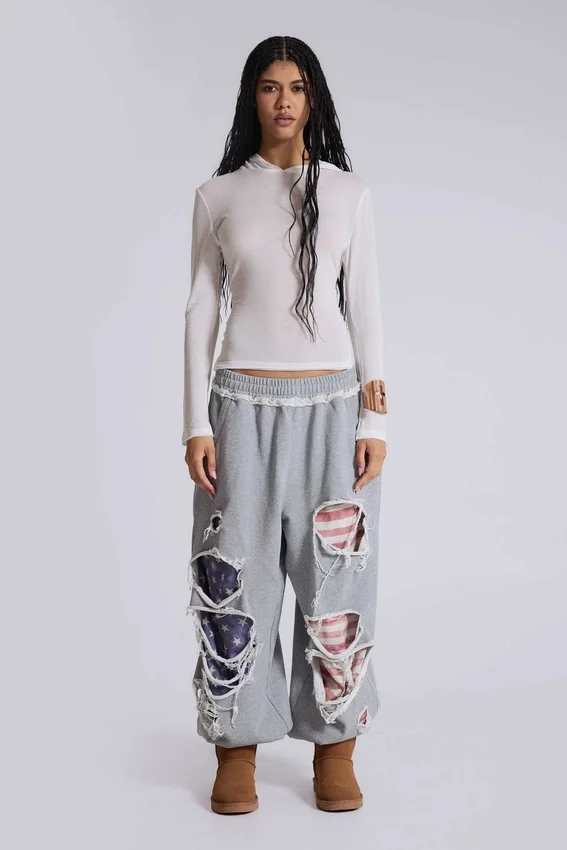 Pantalones de chándal «Monster Joggers» desgastados con estrellas y rayas
