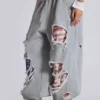 Pantalones de chándal «Monster Joggers» desgastados con estrellas y rayas