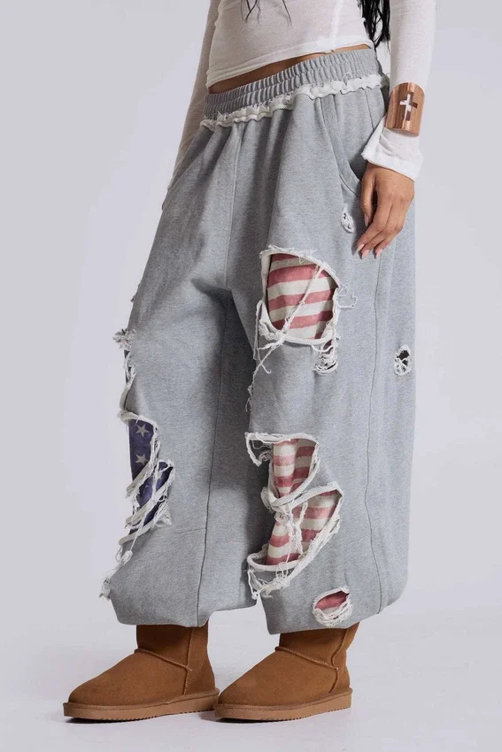 Pantalones de chándal «Monster Joggers» desgastados con estrellas y rayas