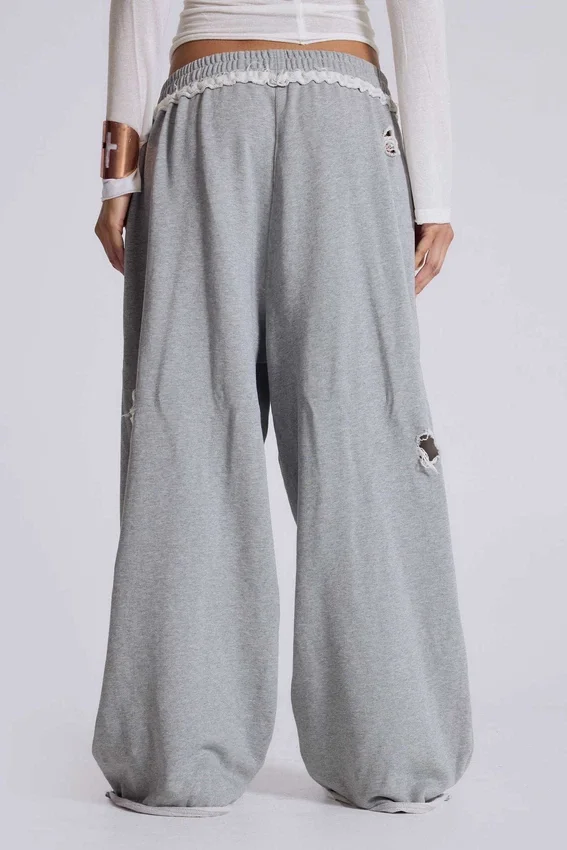 Pantalones de chándal «Monster Joggers» desgastados con estrellas y rayas
