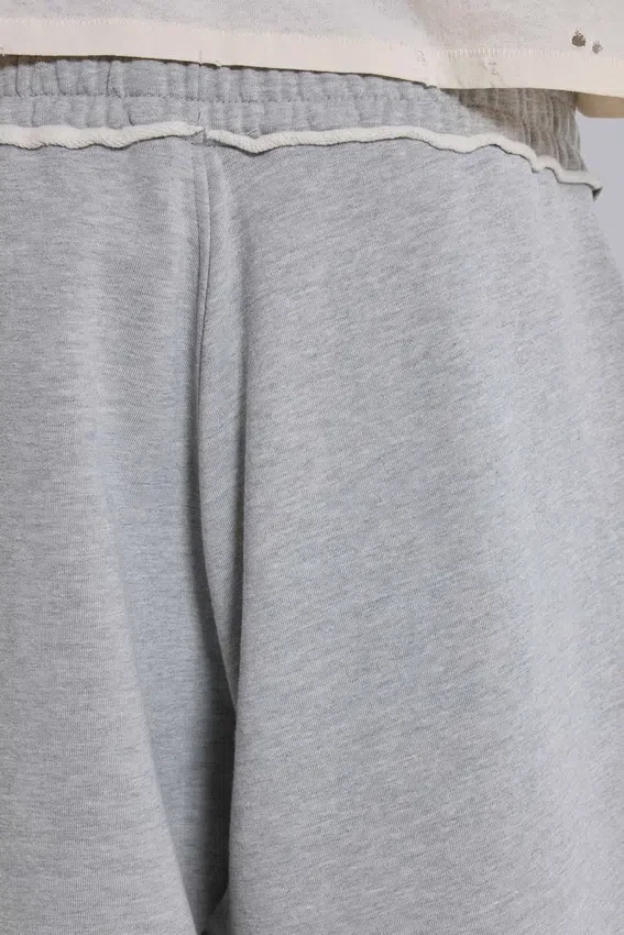 Pantalones de chándal Monster Joggers holgados con puños en gris jaspeado