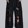 Pantalones de chándal Monster Joggers holgados en negro desgastado