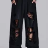 Pantalones de chándal Monster Joggers holgados en negro desgastado