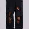 Pantalones de chándal Monster Joggers holgados en negro desgastado