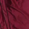 Pantalones de chándal «Vapor» metalizados en color burdeos