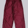 Pantalones de chándal «Vapor» metalizados en color burdeos