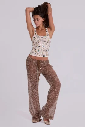 Pantalones de punto con lentejuelas Deva en color arena