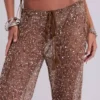 Pantalones de punto con lentejuelas Deva en color arena