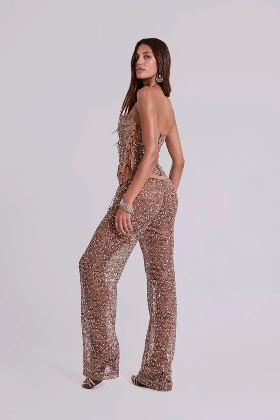 Pantalones de punto con lentejuelas Deva en color arena