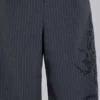 Pantalones de traje Goliath con rayas finas y tatuajes