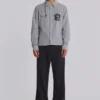 Pantalones de traje grises acampanados con doble pliegue