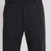 Pantalones de traje grises acampanados con doble pliegue