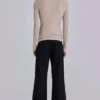 Pantalones de traje rectos con pliegues superpuestos a rayas finas negras