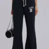 Pantalones jogger holgados de corte acampanado Cleo en negro