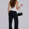 Pantalones jogger holgados de corte acampanado Cleo en negro