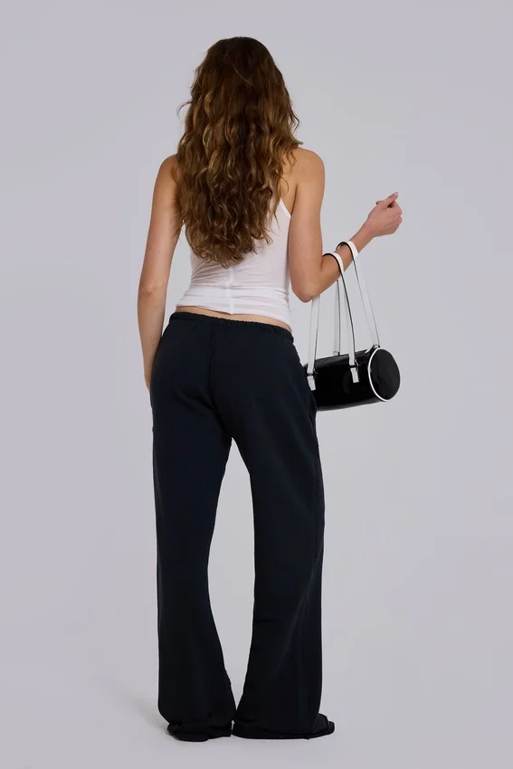 Pantalones jogger holgados de corte acampanado Cleo en negro