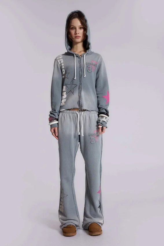 Pantalones jogger holgados de corte acampanado con estampado «Cleo»