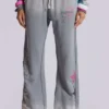 Pantalones jogger holgados de corte acampanado con estampado «Cleo»