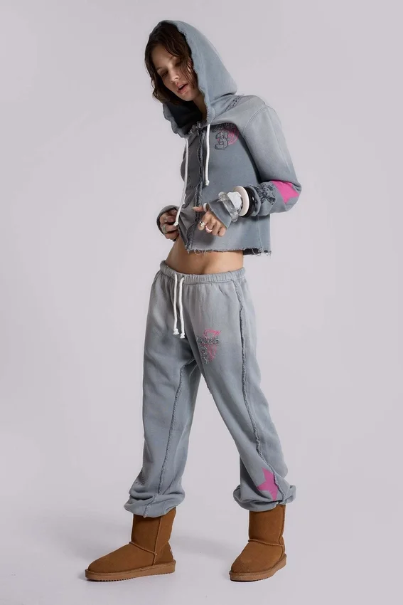 Pantalones jogger holgados de corte acampanado con estampado «Cleo»