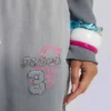 Pantalones jogger holgados de corte acampanado con estampado «Cleo»