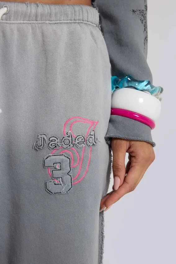 Pantalones jogger holgados de corte acampanado con estampado «Cleo»