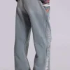 Pantalones jogger holgados de corte acampanado con estampado «Cleo»