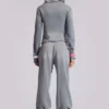 Pantalones jogger holgados de corte acampanado con estampado «Cleo»
