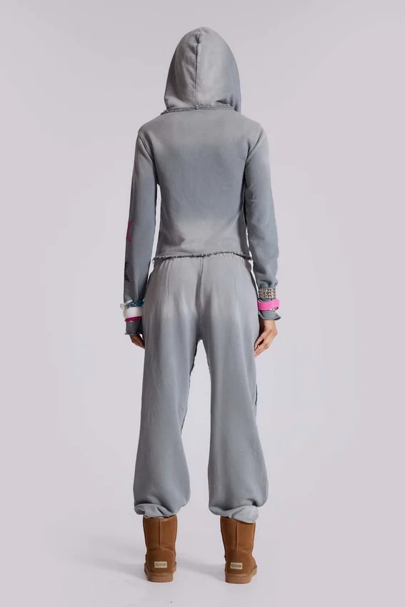 Pantalones jogger holgados de corte acampanado con estampado «Cleo»