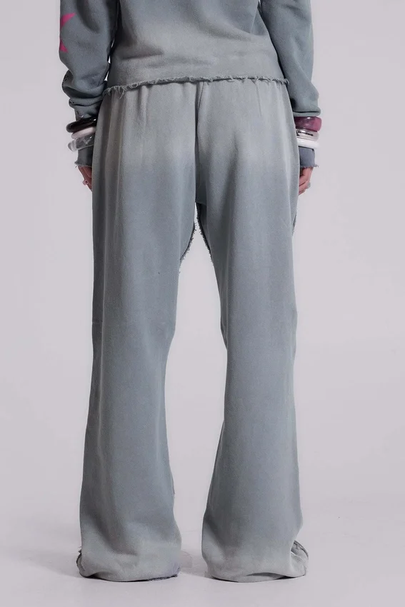 Pantalones jogger holgados de corte acampanado con estampado «Cleo»