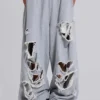Pantalones Monster Joggers holgados en gris jaspeado desgastado