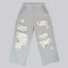 Pantalones Monster Joggers holgados en gris jaspeado desgastado