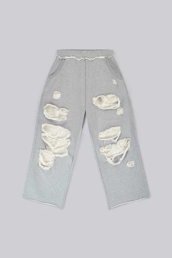 Pantalones Monster Joggers holgados en gris jaspeado desgastado