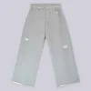 Pantalones Monster Joggers holgados en gris jaspeado desgastado